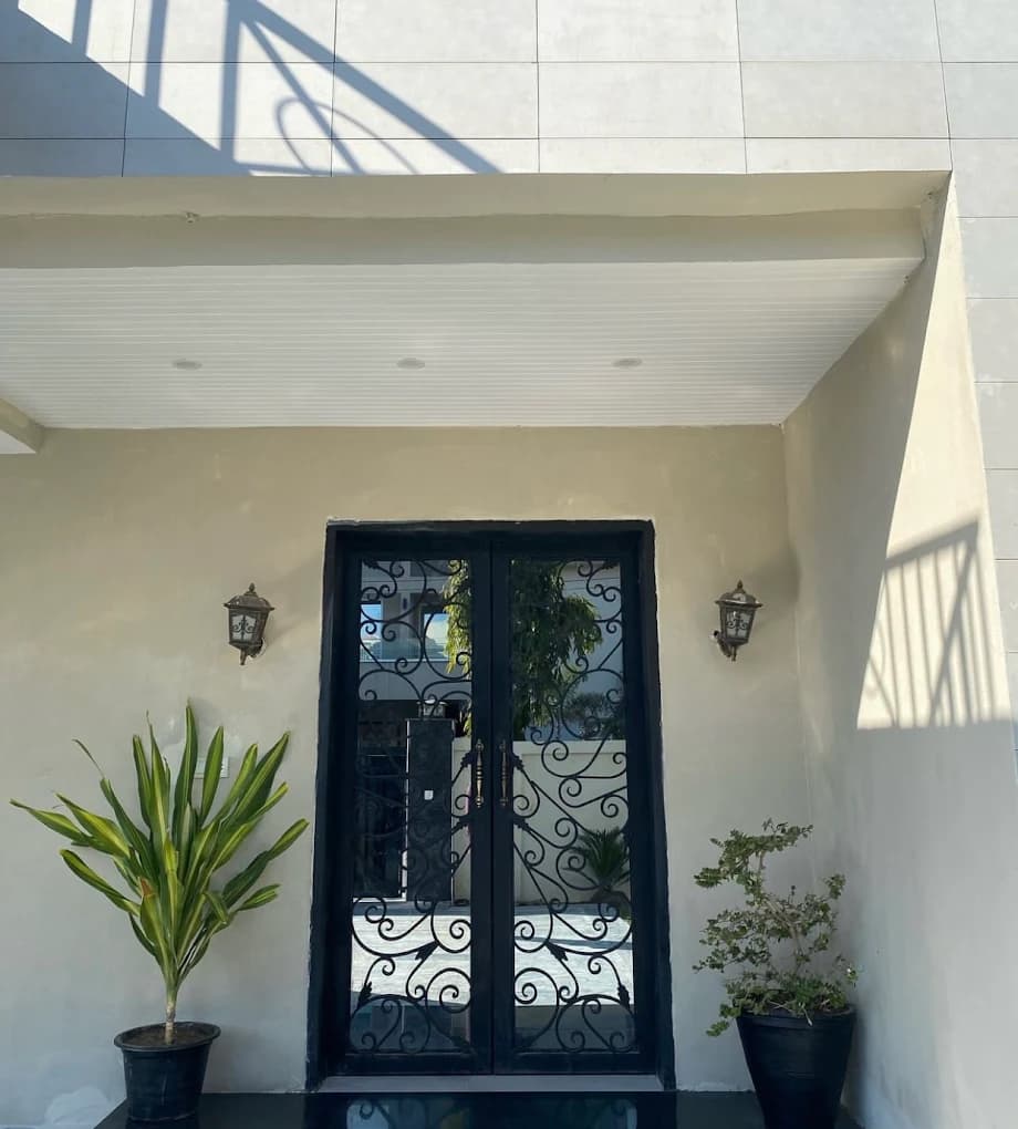 Elegant wrought-iron front entrance of Voila Luxury Skincare clinic in Lahore